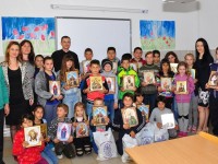 Arhiepiscopia Târgoviștei: Daruri pentru copii ai Școlii „Pictor Nicolae Grigorescu” din Titu!