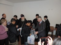 IPS Părinte Mitropolit Nifon și președintele CJD au oferit cadouri copiilor din mai multe centre sociale